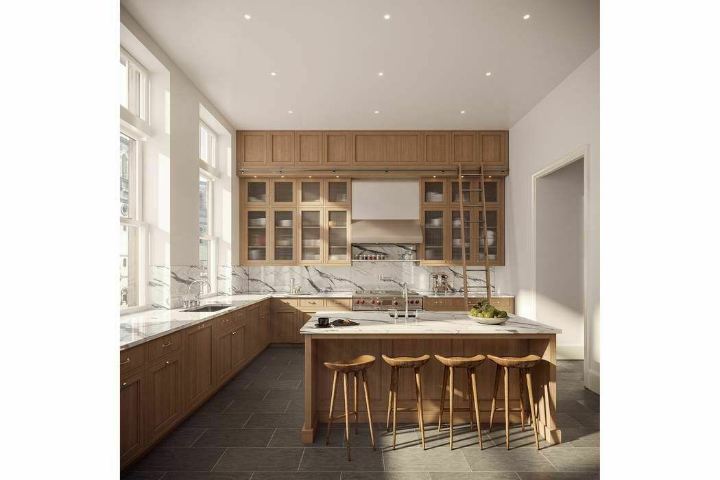 555 West End Avenue, Unit THE LIBRARY Manhattan, NY 10024 - Photo 3 of 12 a dining room with a table chairs and a kitchen view