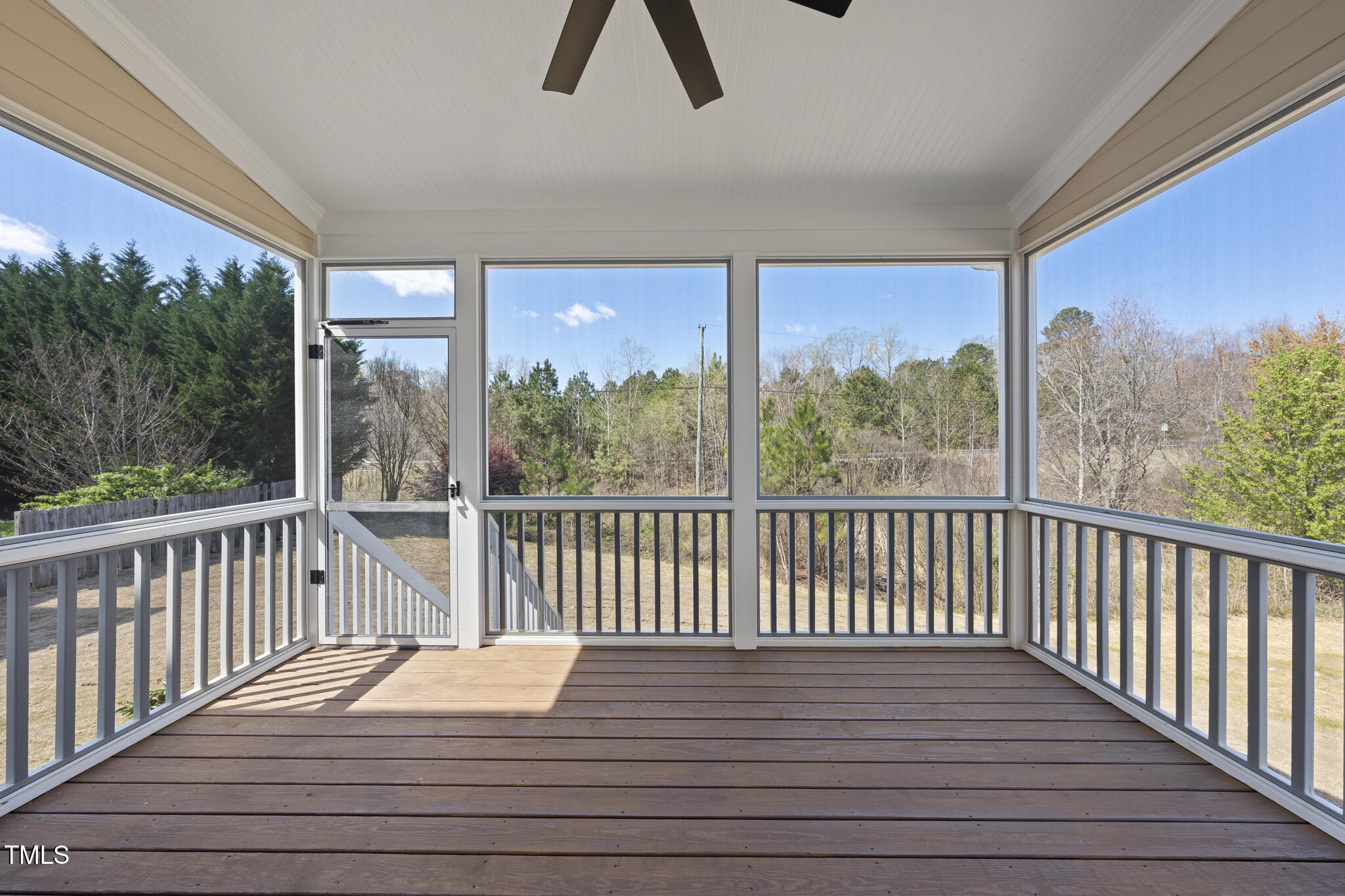10119 2nd Star Court Raleigh, NC 27613 - Photo 34 of 39 a view of balcony with wooden floor and fence