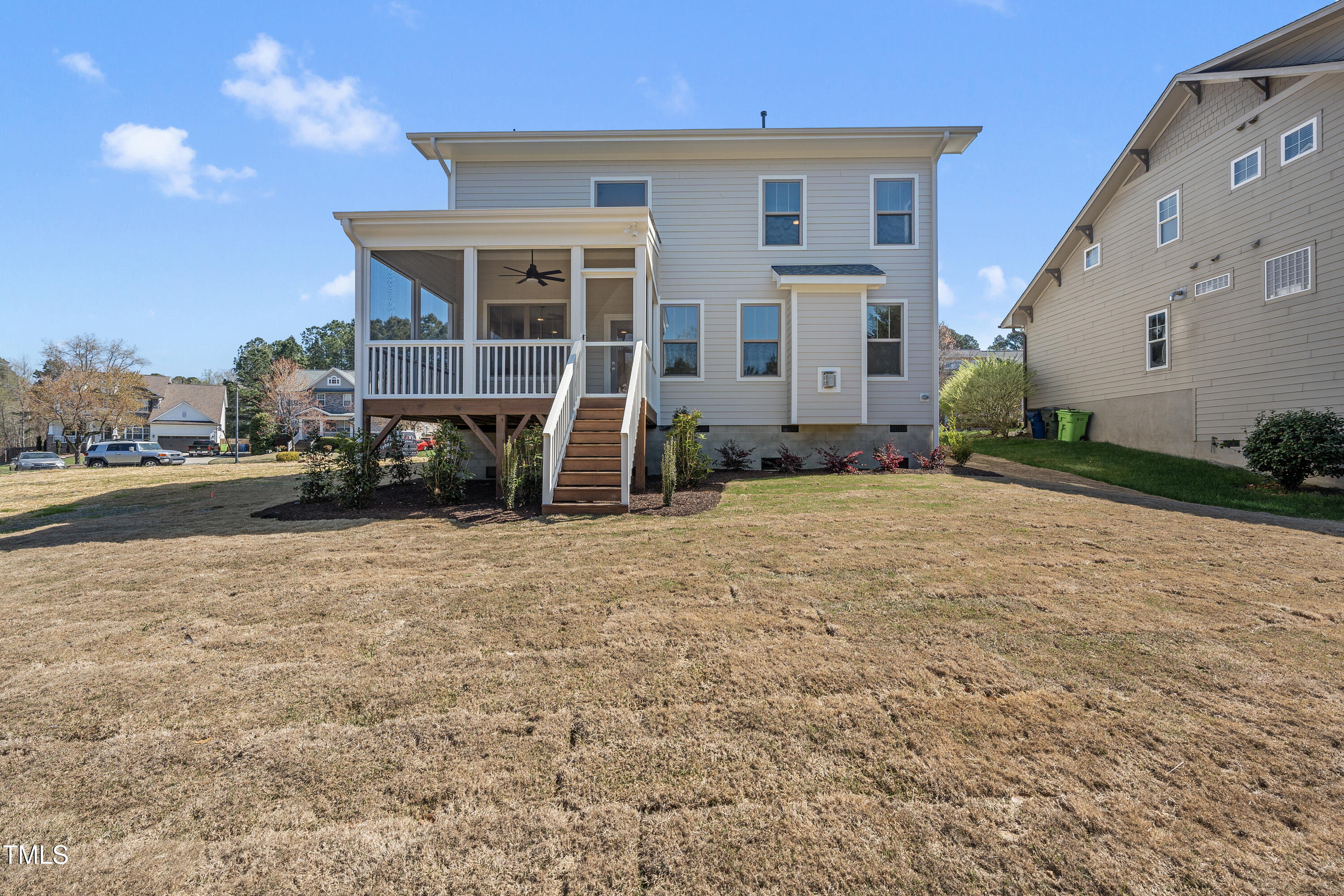 10119 2nd Star Court Raleigh, NC 27613 - Photo 36 of 39 a view of a house with backyard and a tree