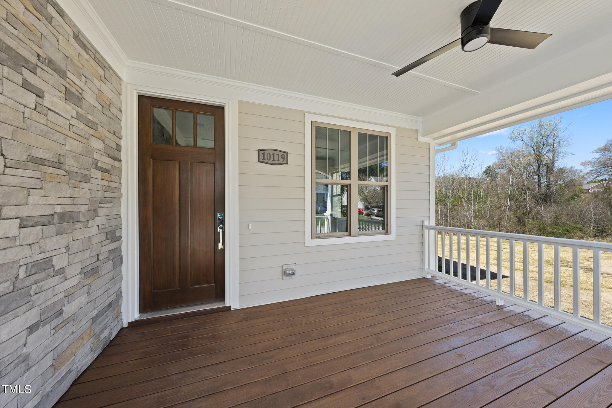 10119 2nd Star Court Raleigh, NC 27613 - Photo 9 of 39 an empty room with wooden floor and windows