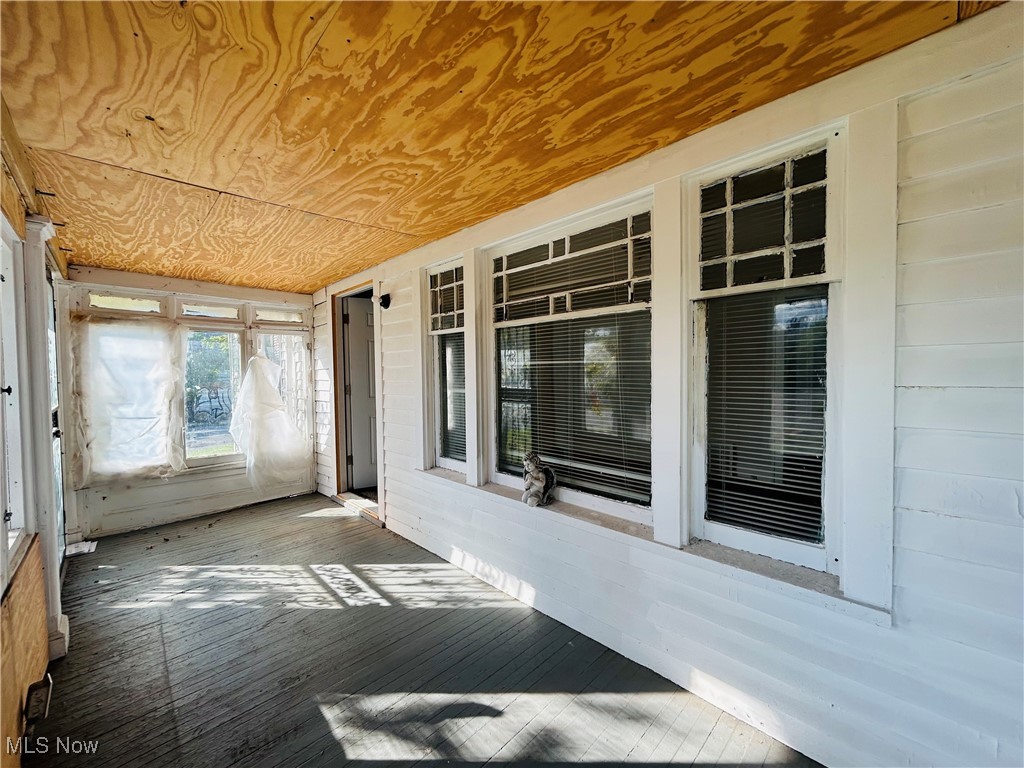 13401 Rugby Road Cleveland, OH 44110 - Photo 4 of 17 View of unfurnished sunroom