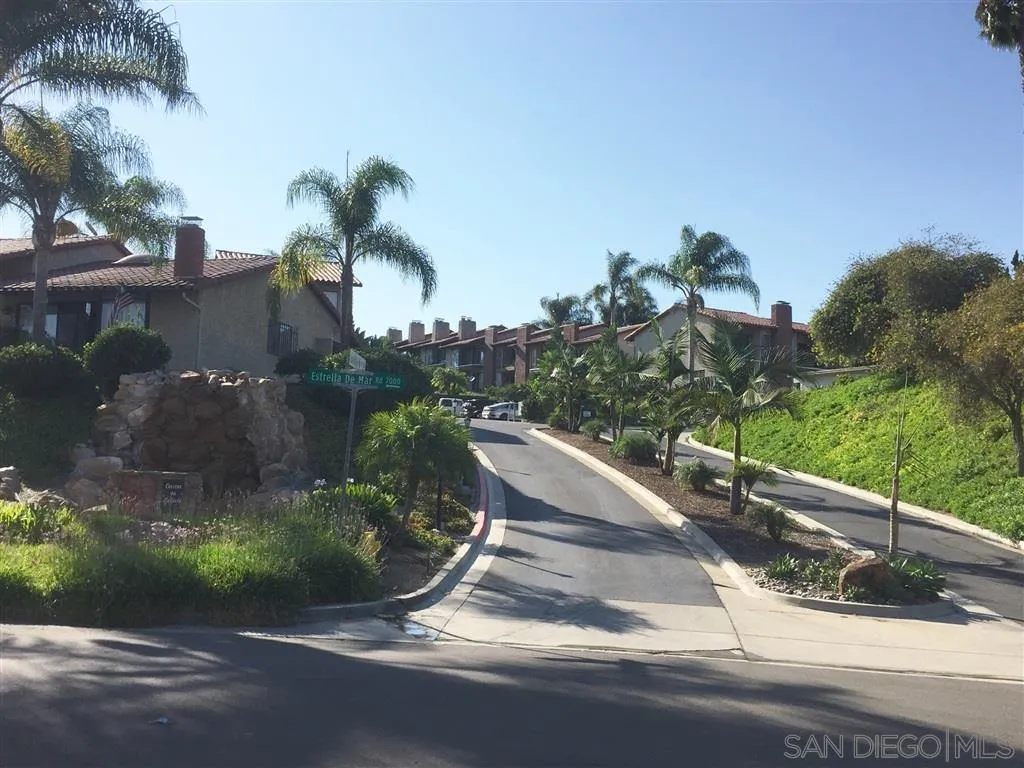 1939 Alga Road, Unit A Carlsbad, CA 92009 - Photo 20 of 25 a view of a street with a building in the background