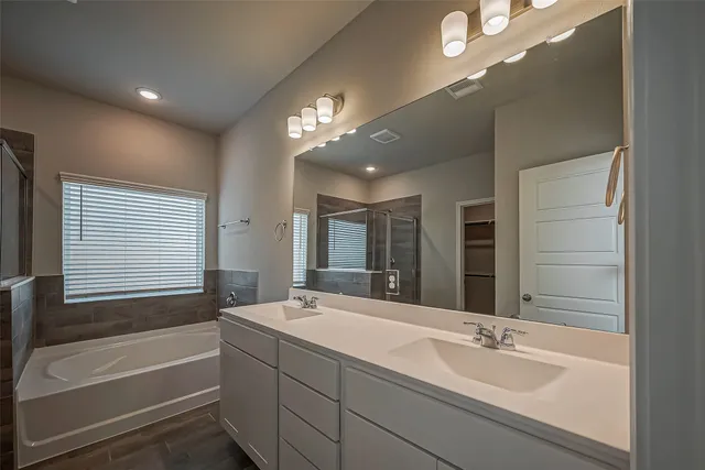 an empty room with closet area