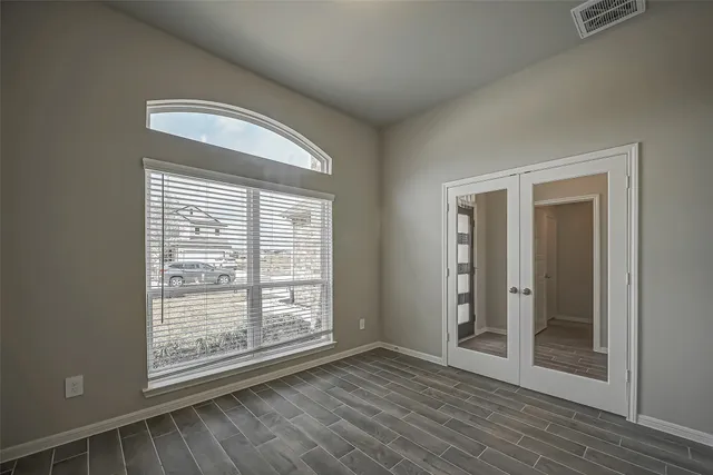 a kitchen with stainless steel appliances granite countertop a sink and stove top oven