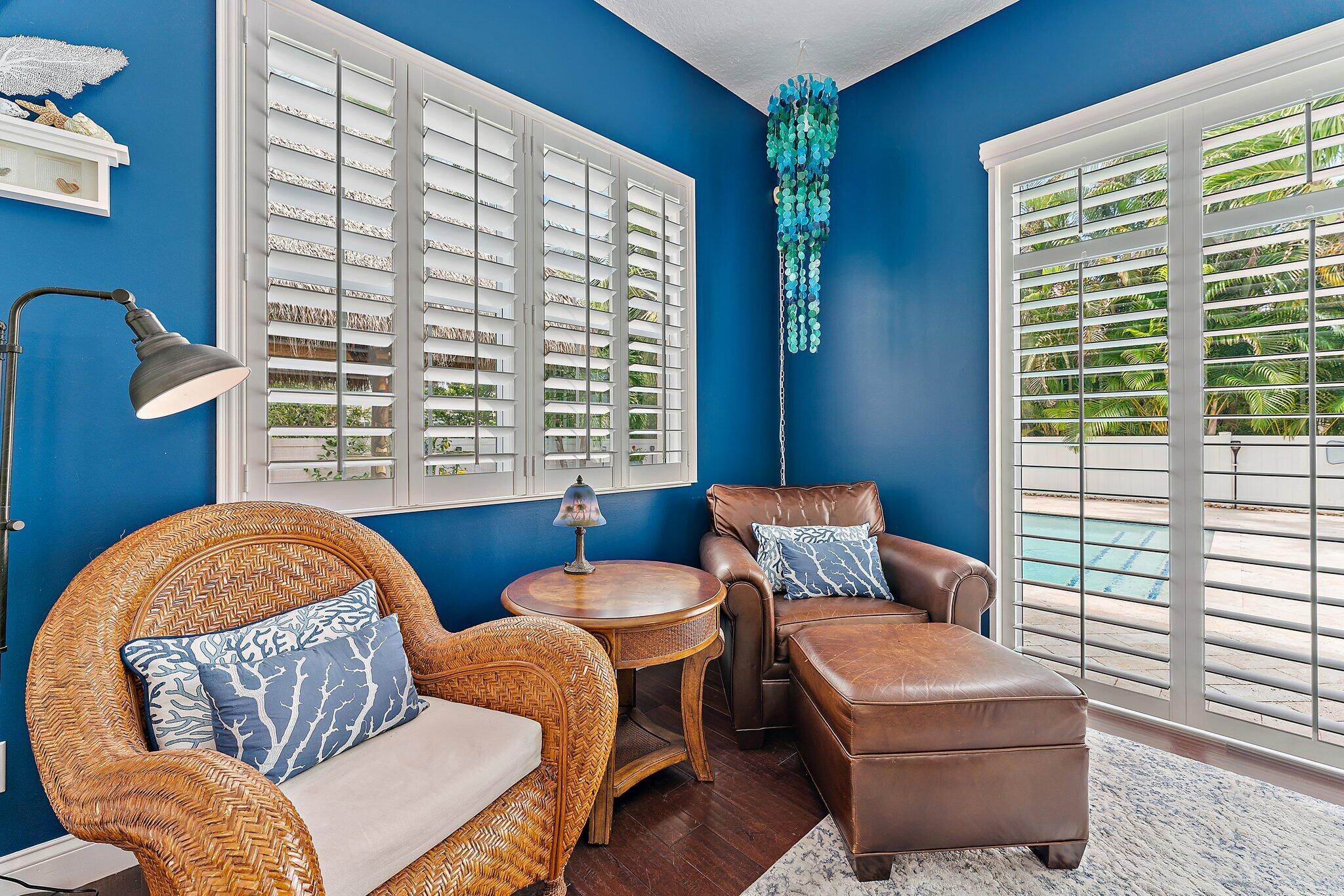 334 Caravelle Drive Jupiter, FL 33458 - Photo 25 of 55 a work room with furniture and a window