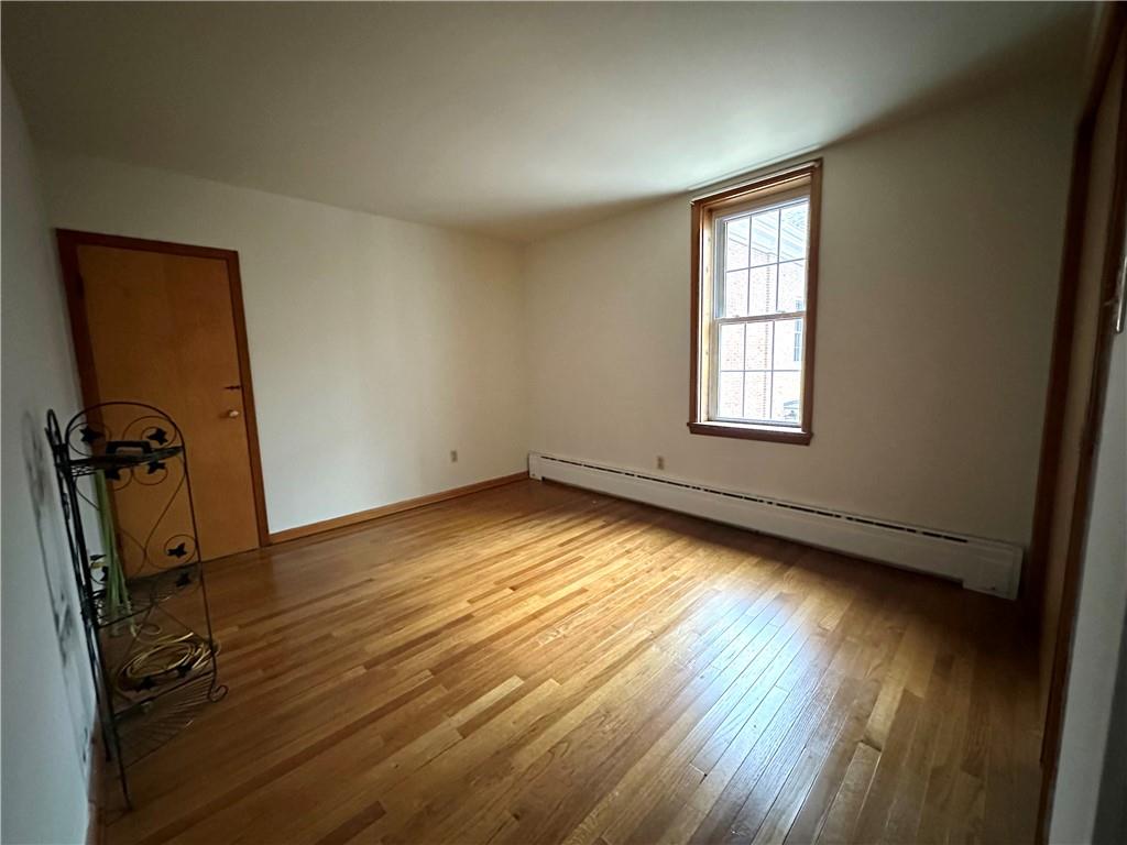 116 East Main Street Ligonier, PA 15658 - Photo 14 of 17 a view of a room with wooden floor and a window