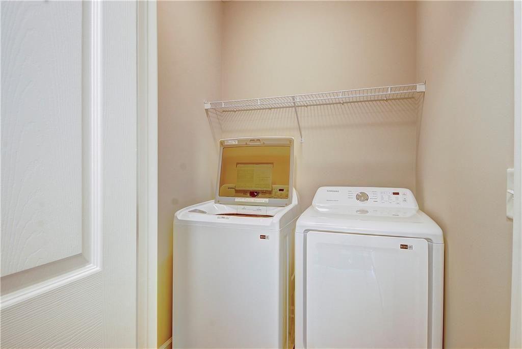 1643 Jackson Way Atlanta, GA 30318 - Photo 12 of 22 a utility room with dryer and washer