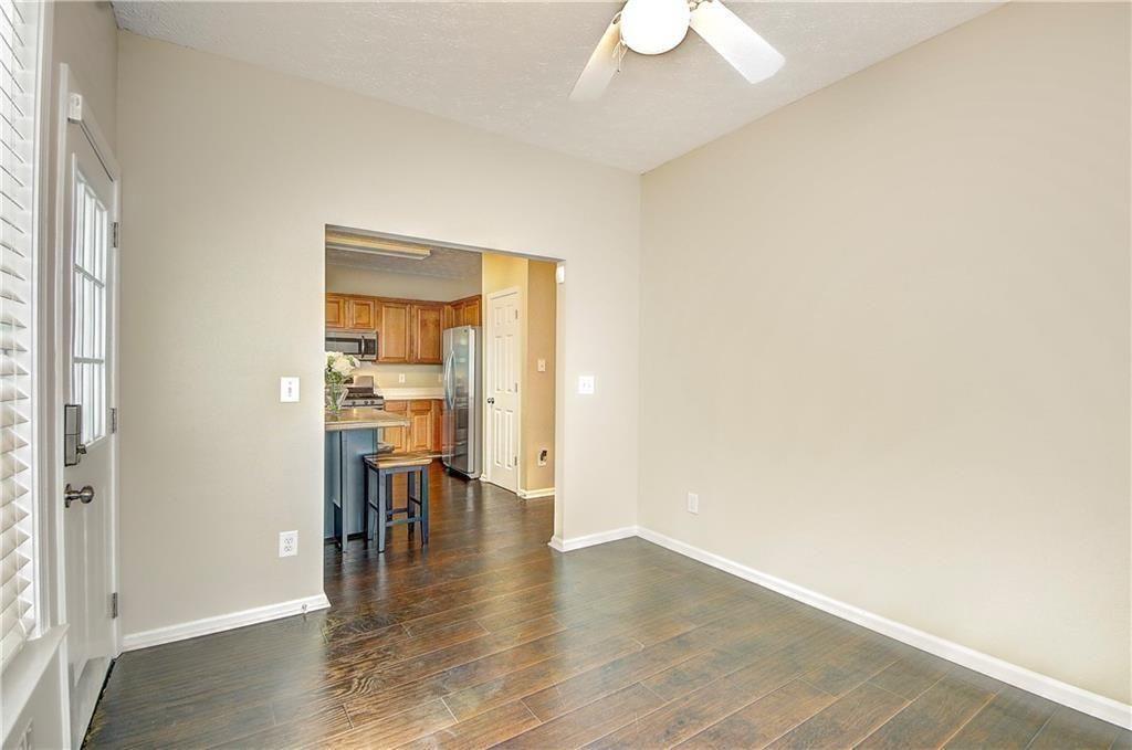 1643 Jackson Way Atlanta, GA 30318 - Photo 10 of 22 a view of a kitchen with a table and chairs