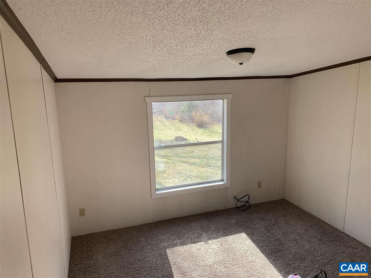 8914 Durrette Road Afton, VA 22920 - Photo 11 of 30 a view of an empty room with a window
