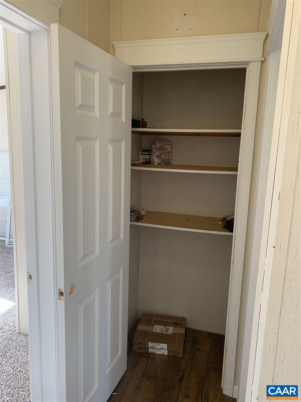 8914 Durrette Road Afton, VA 22920 - Photo 13 of 30 a view of walk in closet with empty racks