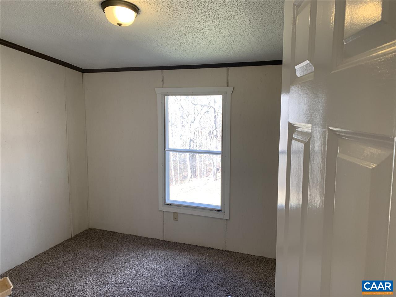 8914 Durrette Road Afton, VA 22920 - Photo 14 of 30 an empty room with windows