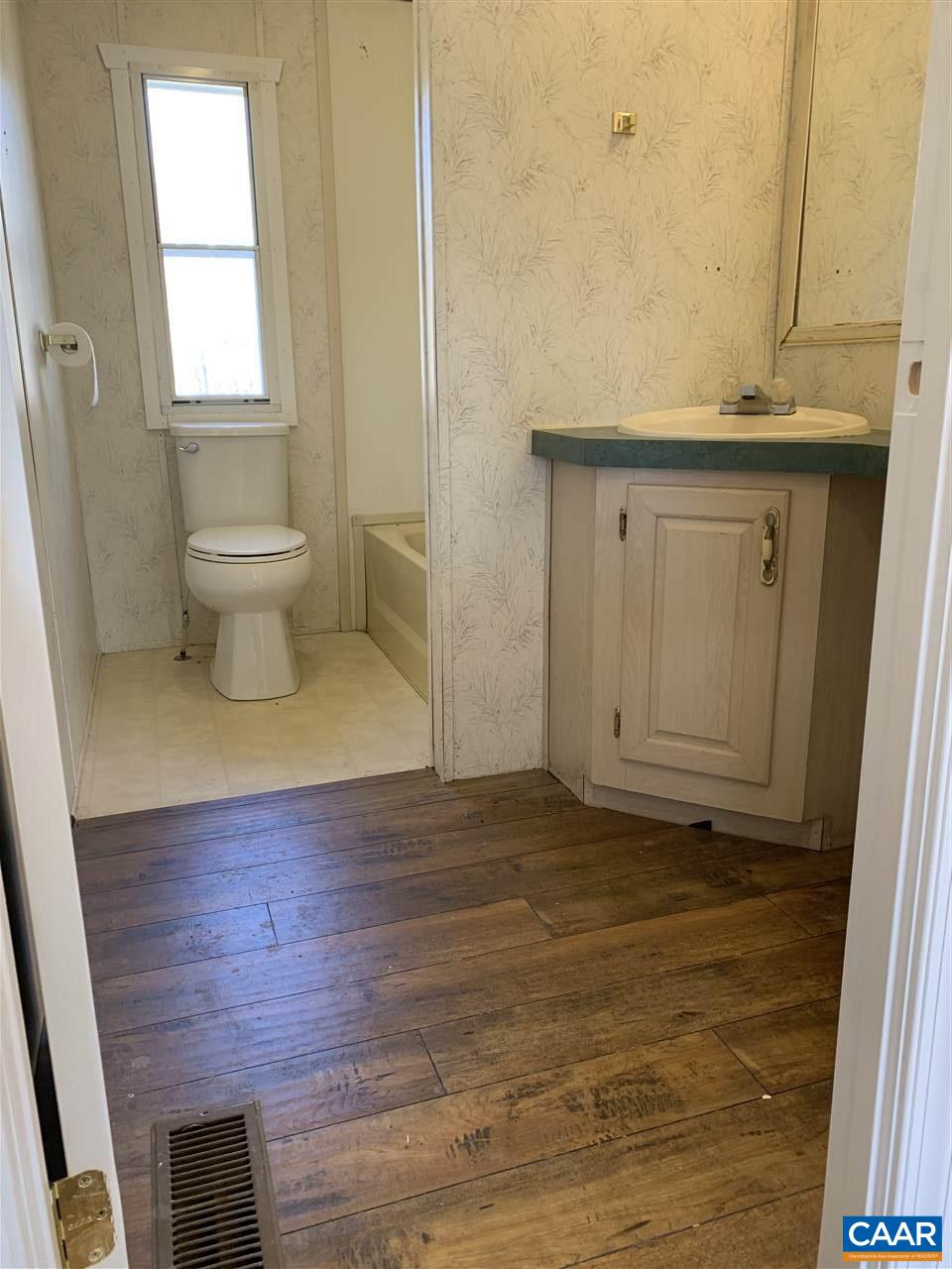 8914 Durrette Road Afton, VA 22920 - Photo 16 of 30 a view of a bathroom with a sink and a toilet