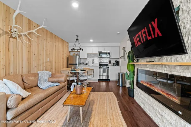 a view of a front door and deck back yard