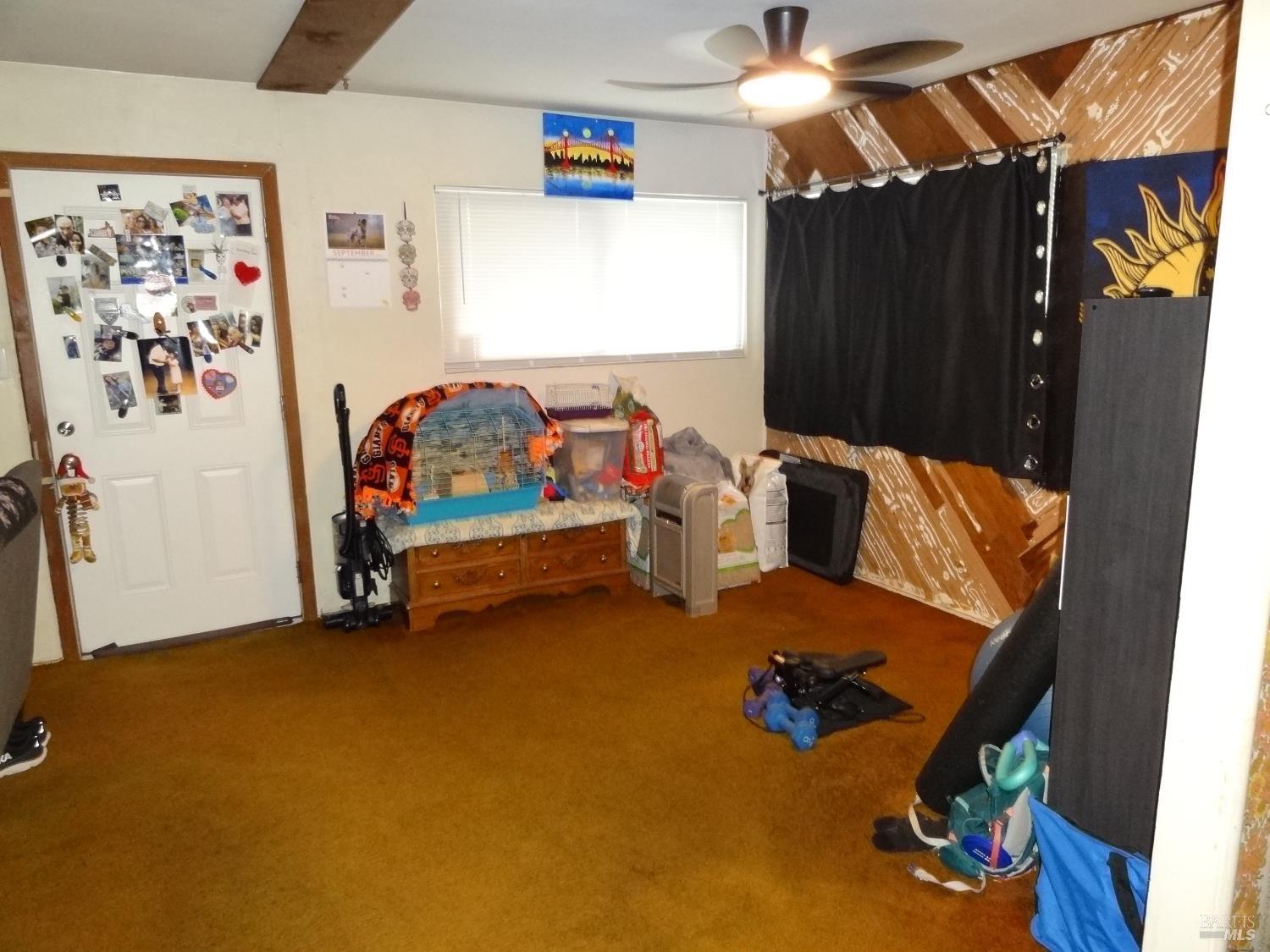 1005 Temple Avenue Santa Rosa, CA 95404 - Photo 12 of 20 a bedroom with bed and furniture