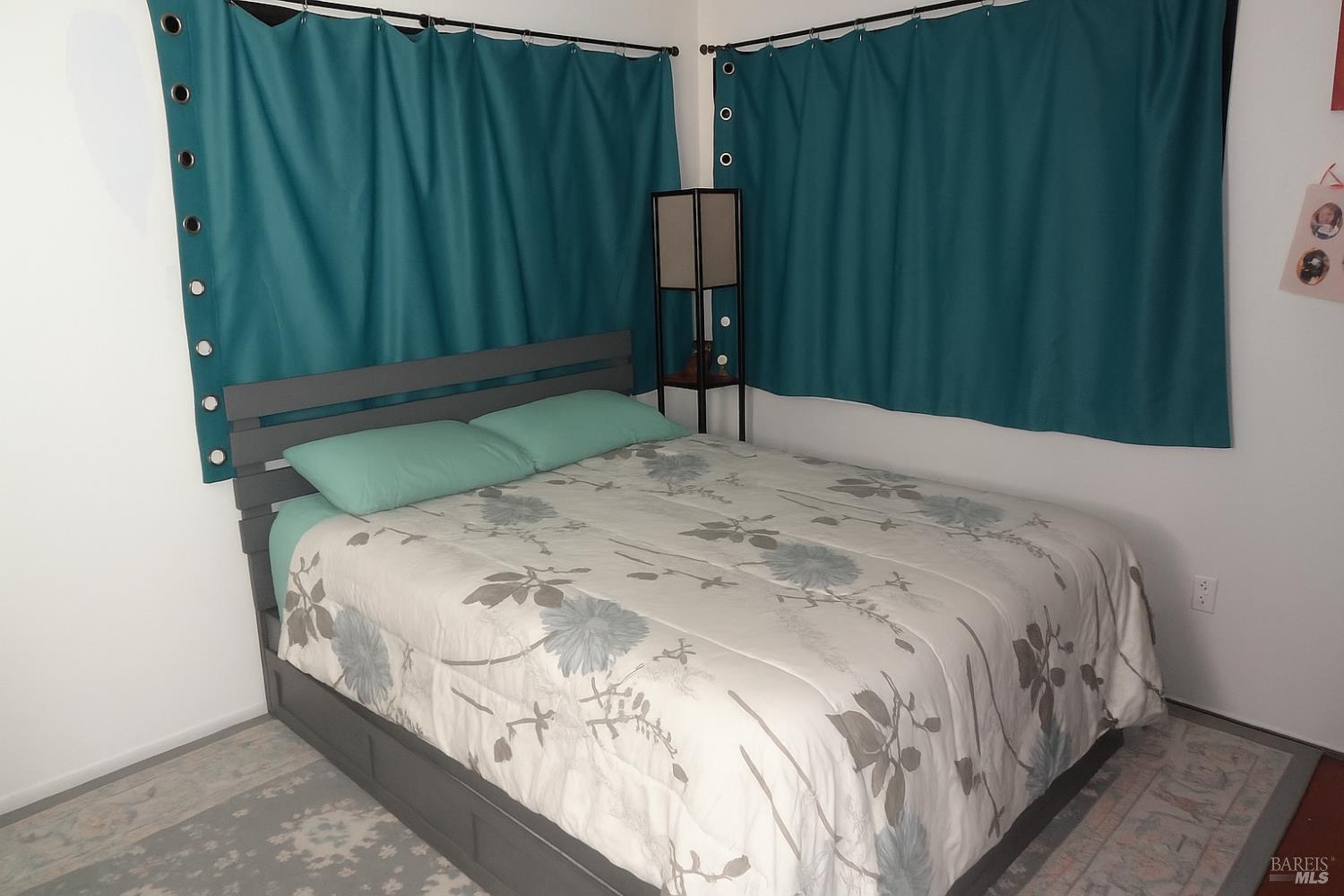 1005 Temple Avenue Santa Rosa, CA 95404 - Photo 20 of 20 a bedroom with a bed and a window