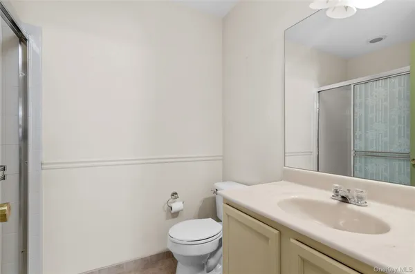 a bathroom with a sink and a toilet