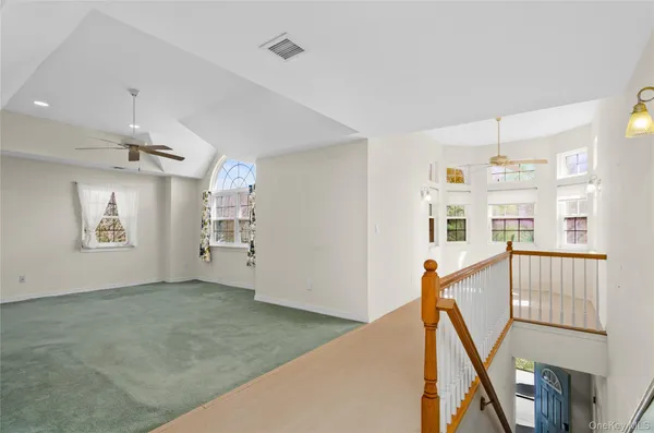 a view of a hallway with workspace