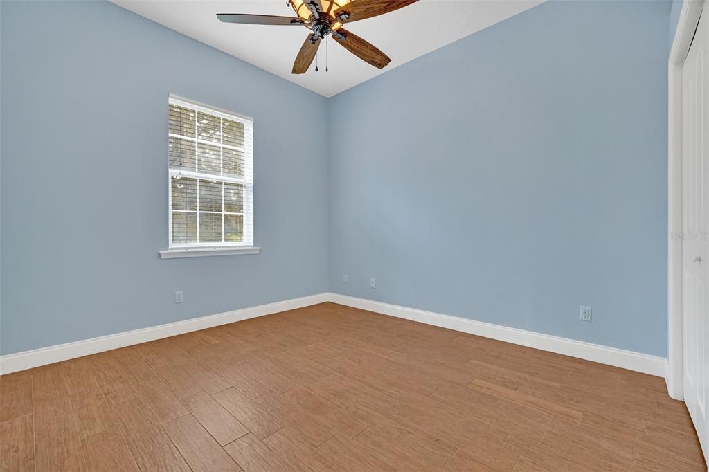9824 Brantley Road Lithia, FL 33547 - Photo 23 of 38 an empty room with a window and a fan