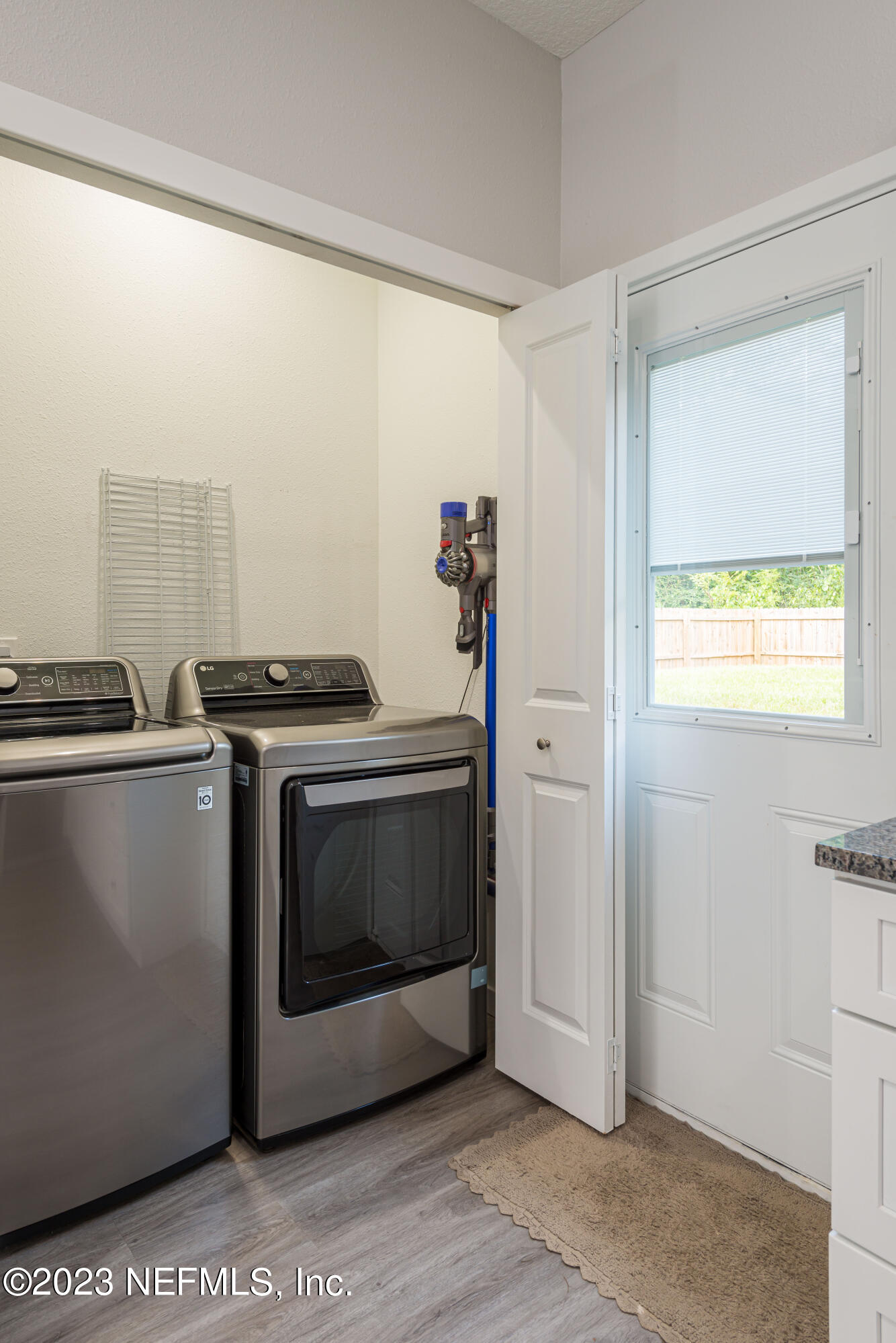 461 Herbert Street St. Augustine, FL 32084 - Photo 7 of 15 a kitchen with a stove and a microwave
