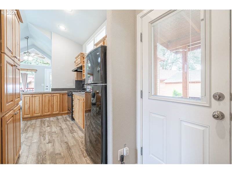 8372 Enchanted Way Southeast, Unit 192 Turner, OR 97392 - Photo 14 of 27 a very nice looking room with a large window and wooden floor