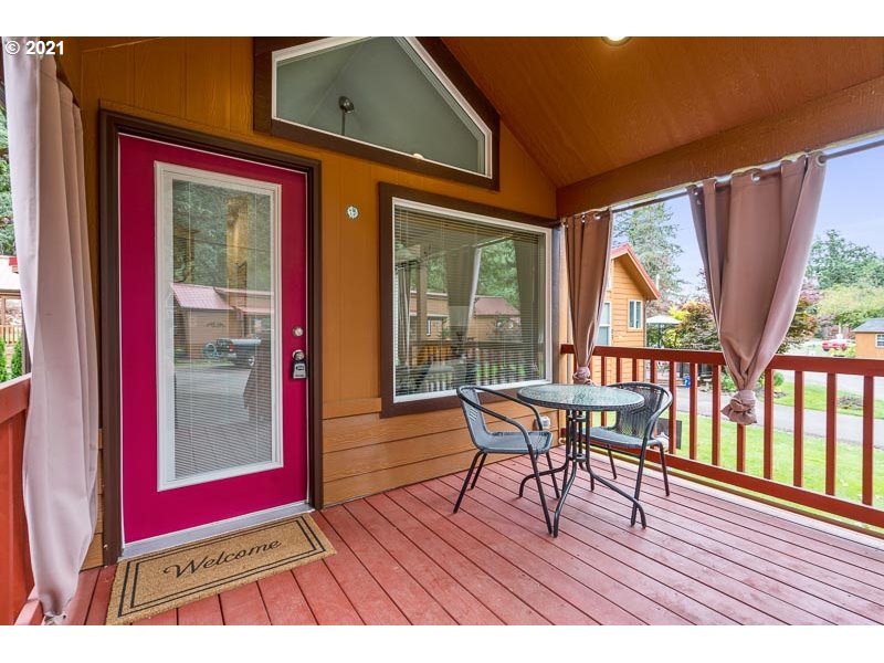 8372 Enchanted Way Southeast, Unit 192 Turner, OR 97392 - Photo 3 of 27 a dining room with furniture and wooden floor