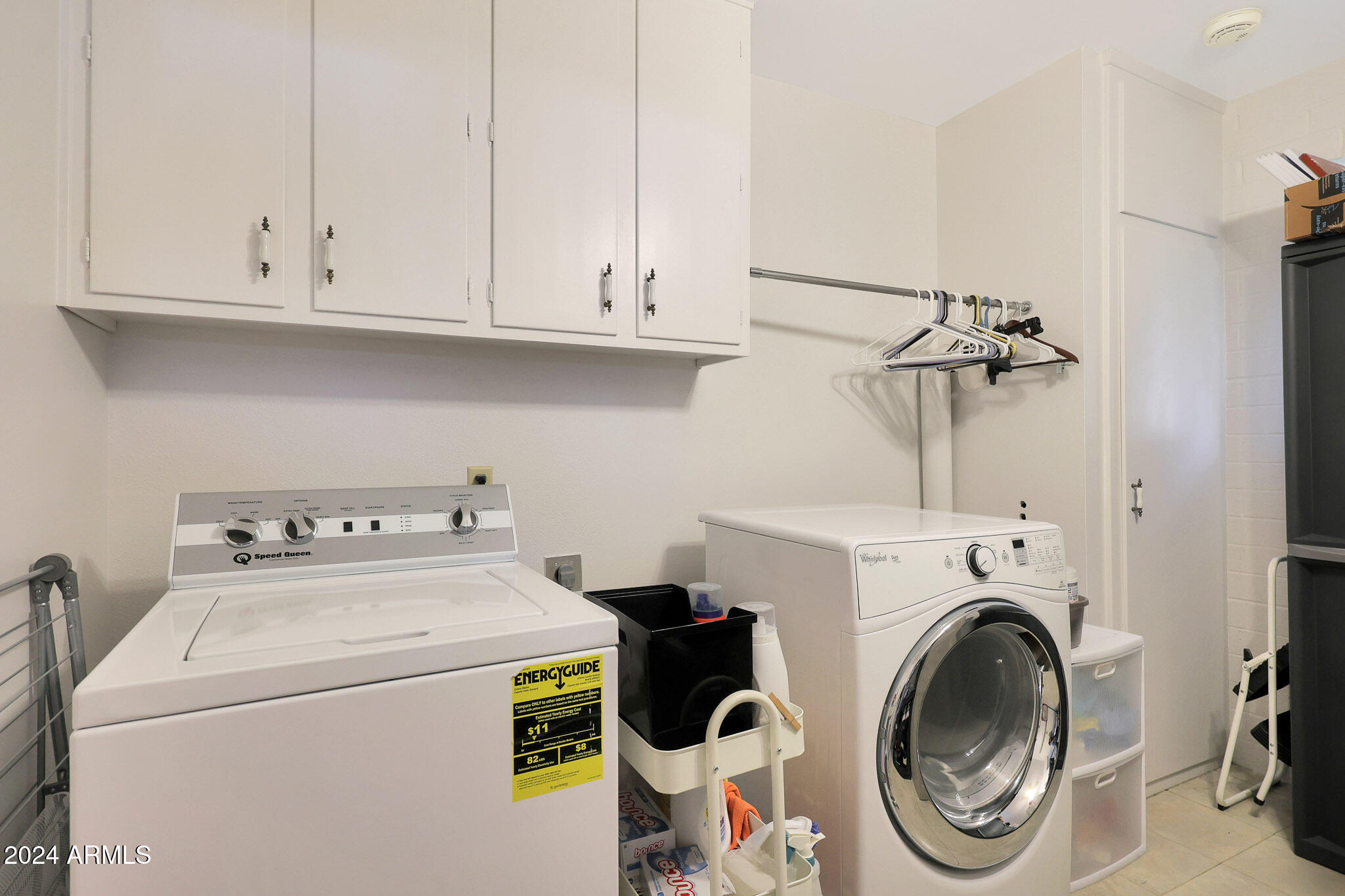 10137 West Mountain View Road Sun City, AZ 85351 - Photo 21 of 34 a utility room with dryer and washer