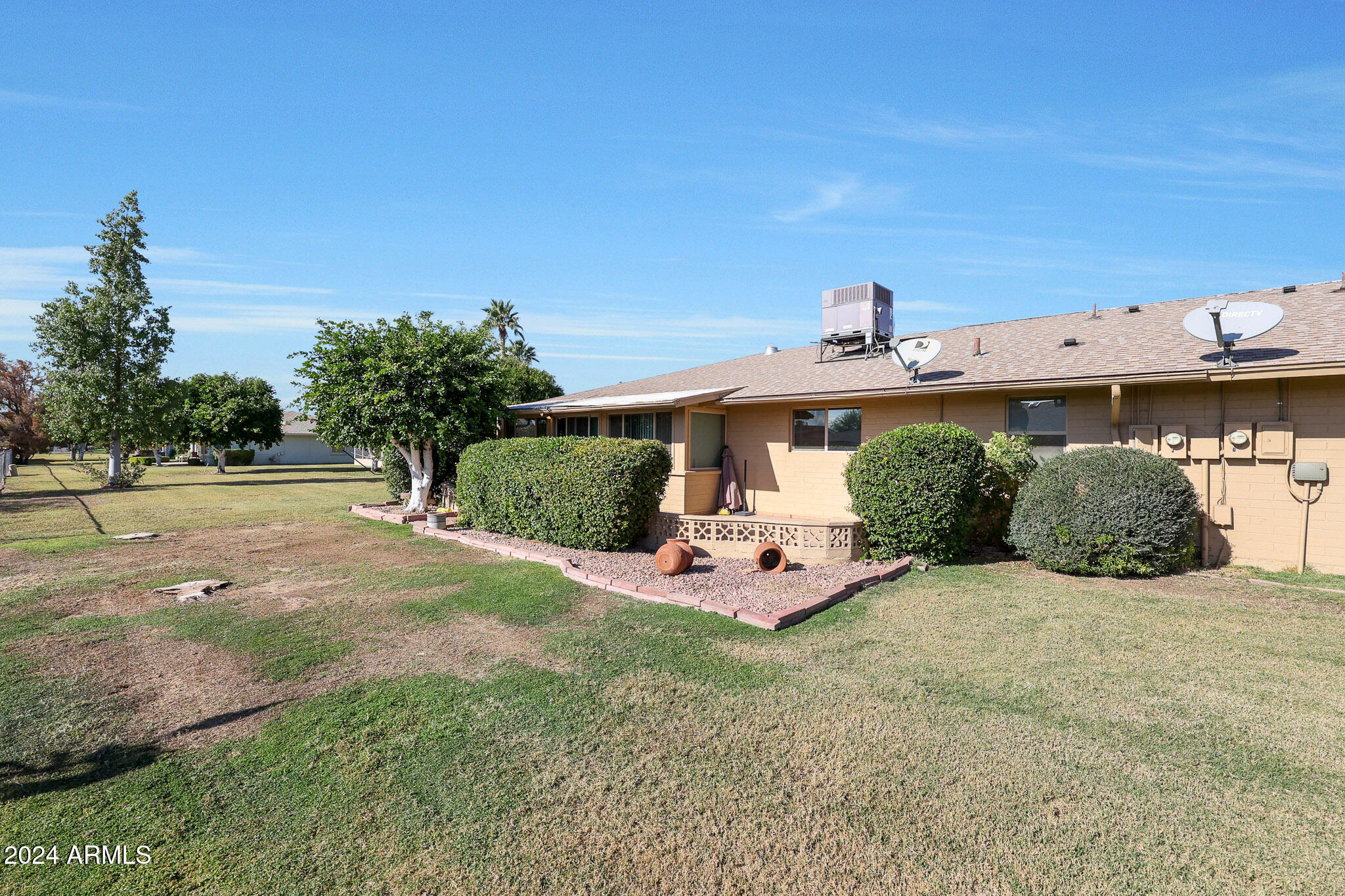 10137 West Mountain View Road Sun City, AZ 85351 - Photo 33 of 34 a view of a backyard with sitting area