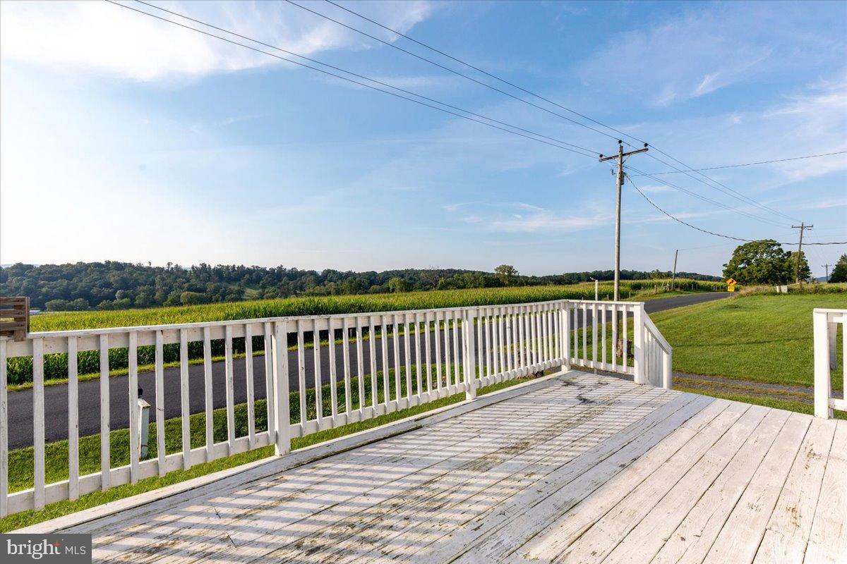 919 Ridge Hollow Road Edinburg, VA 22824 - Photo 13 of 35 Scenic views from a charming deck retreat.