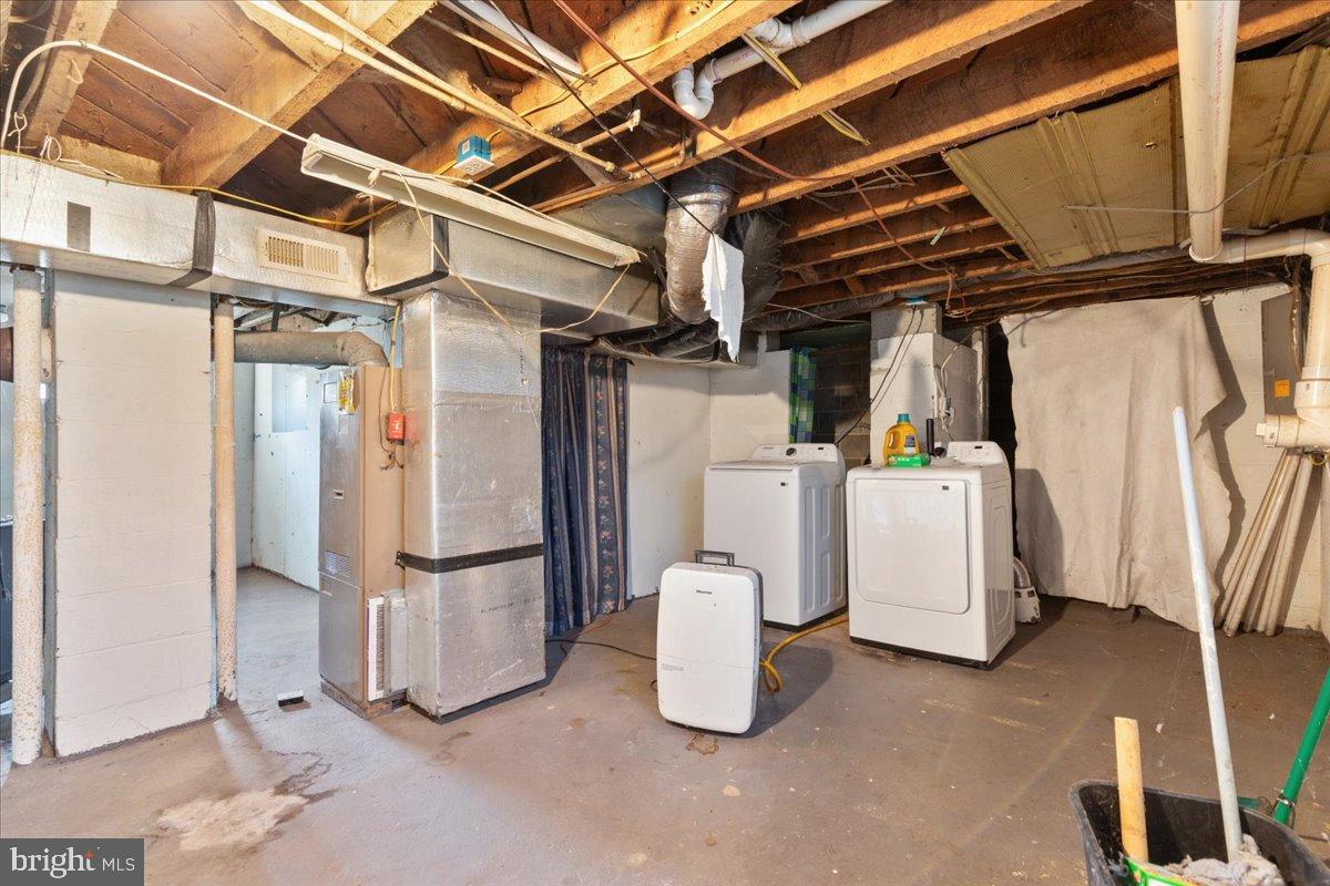 919 Ridge Hollow Road Edinburg, VA 22824 - Photo 14 of 35 Spacious basement with laundry facilities.