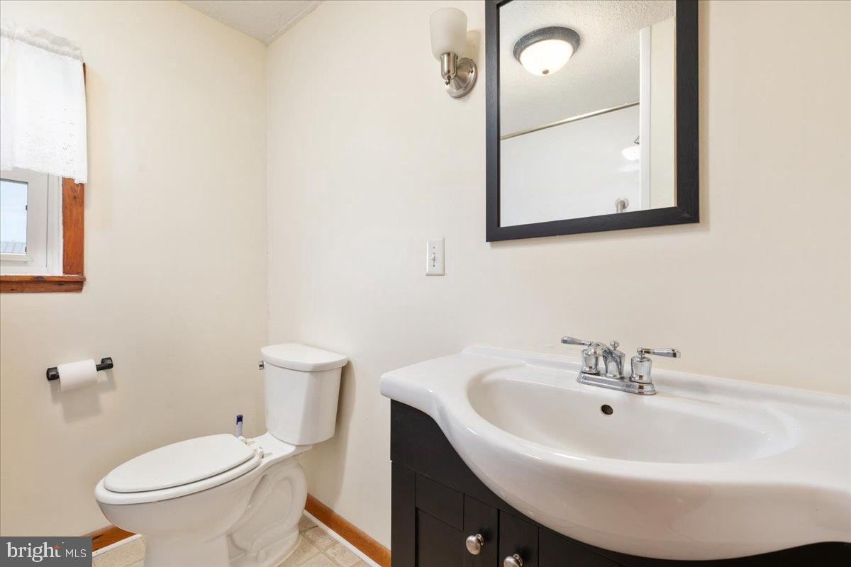 919 Ridge Hollow Road Edinburg, VA 22824 - Photo 33 of 35 Bright and functional bathroom retreat.