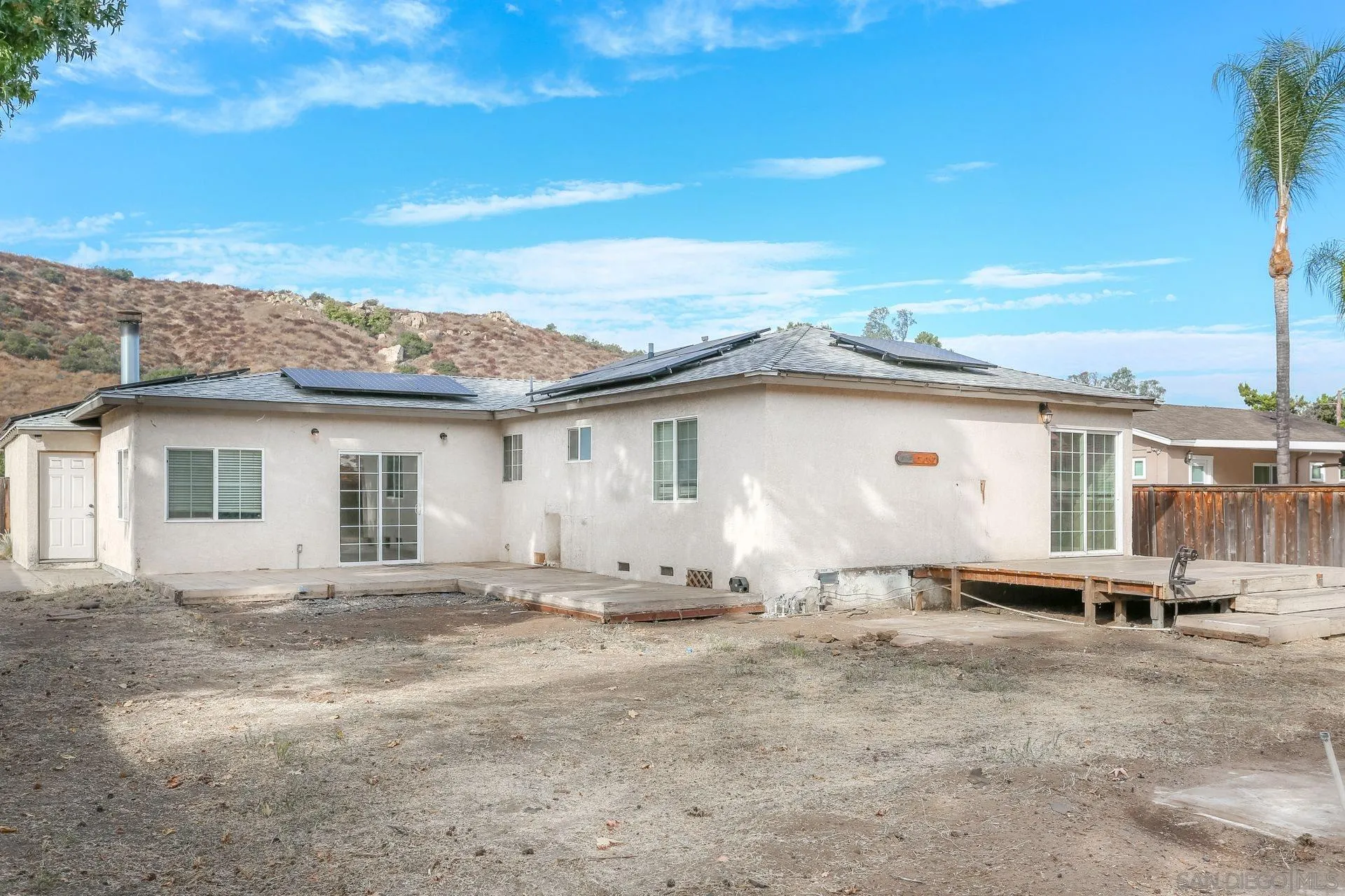 9255 Los Coches Road Lakeside, CA 92040 - Photo 29 of 34 a view of a house with a yard