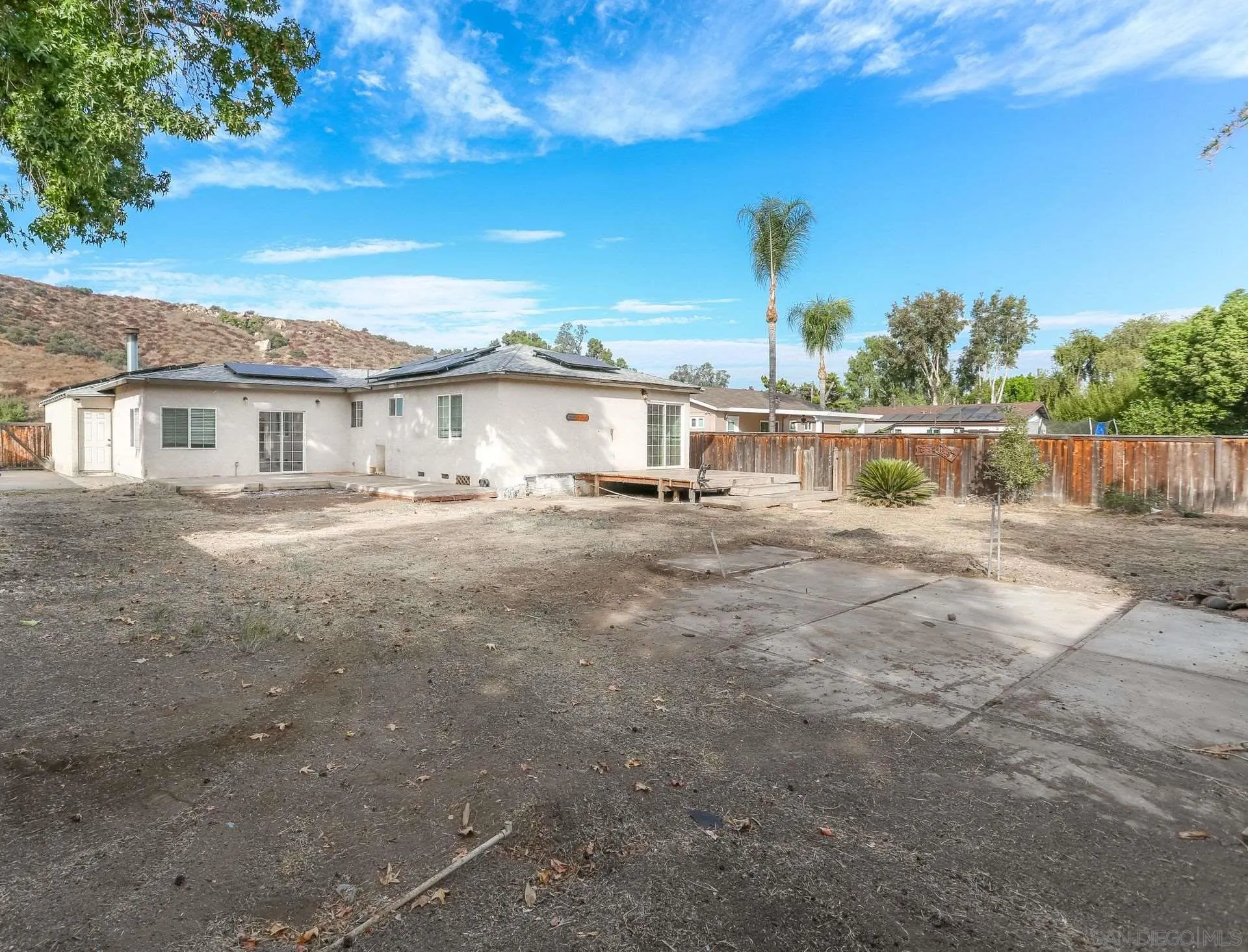9255 Los Coches Road Lakeside, CA 92040 - Photo 31 of 34 a view of a house with a yard