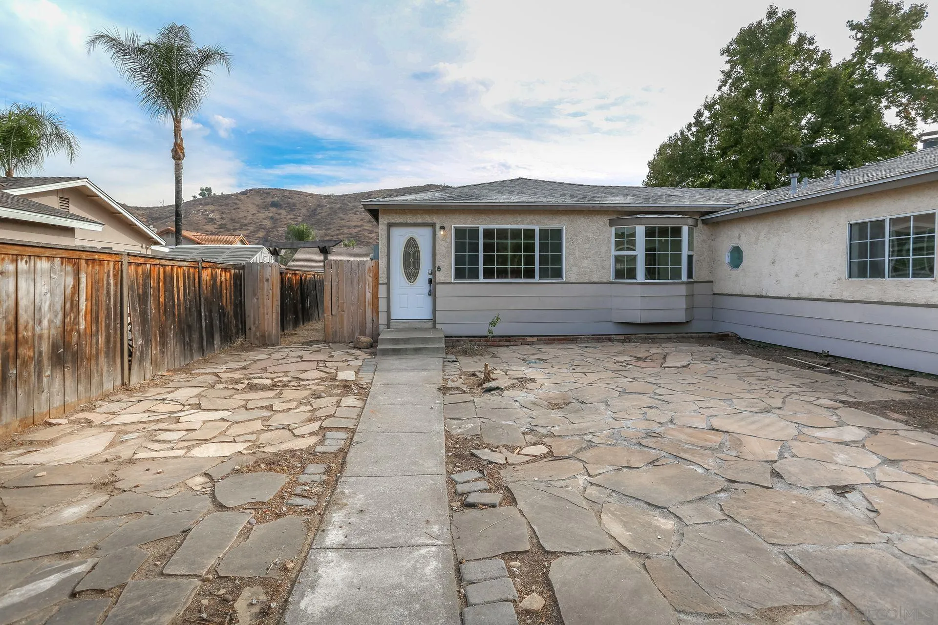9255 Los Coches Road Lakeside, CA 92040 - Photo 4 of 34 a view of a house with a yard