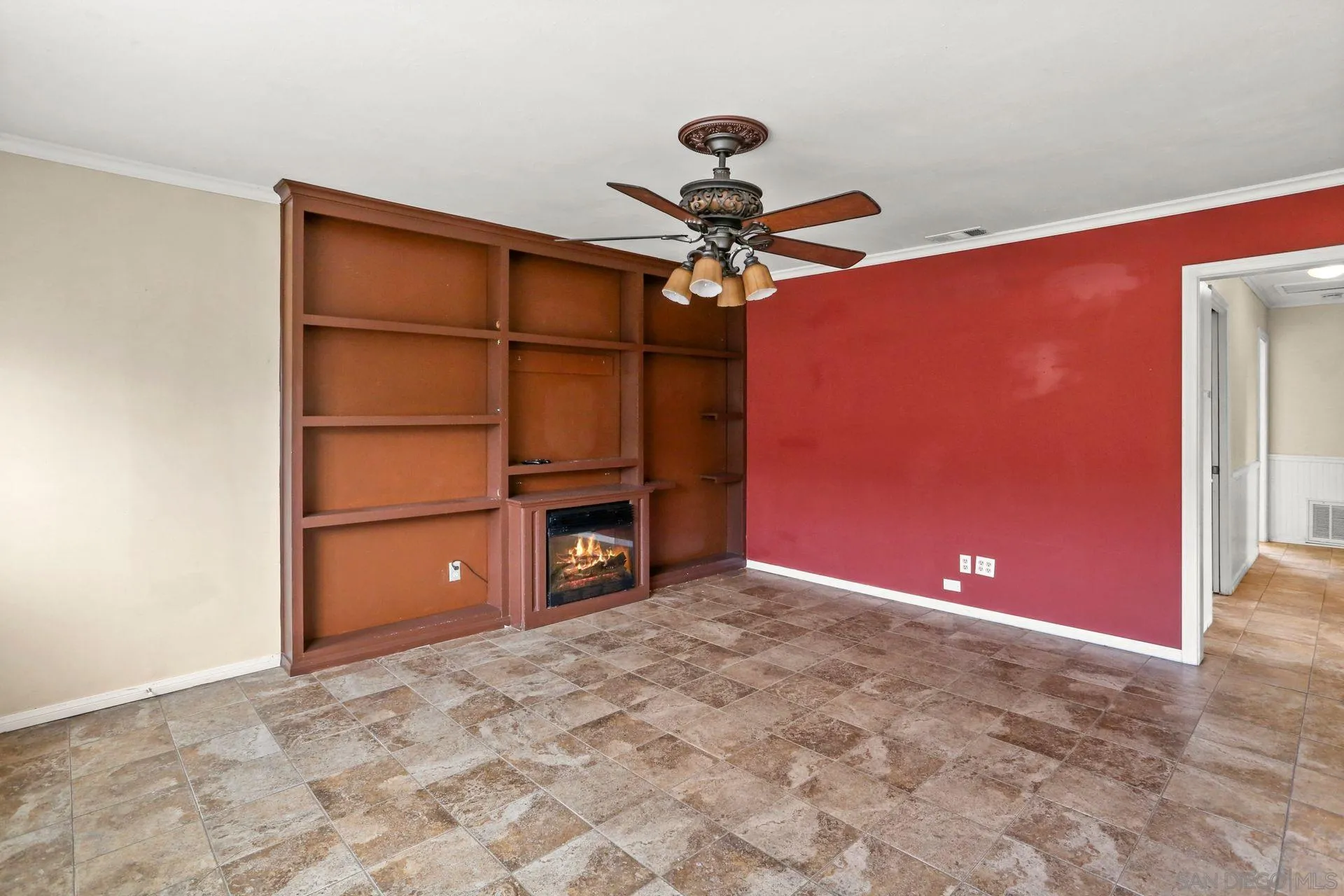 9255 Los Coches Road Lakeside, CA 92040 - Photo 6 of 34 a view of a livingroom with a sofa and a ceiling fan
