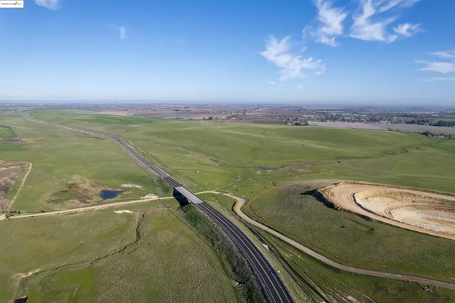 a view of a lake from a balcony