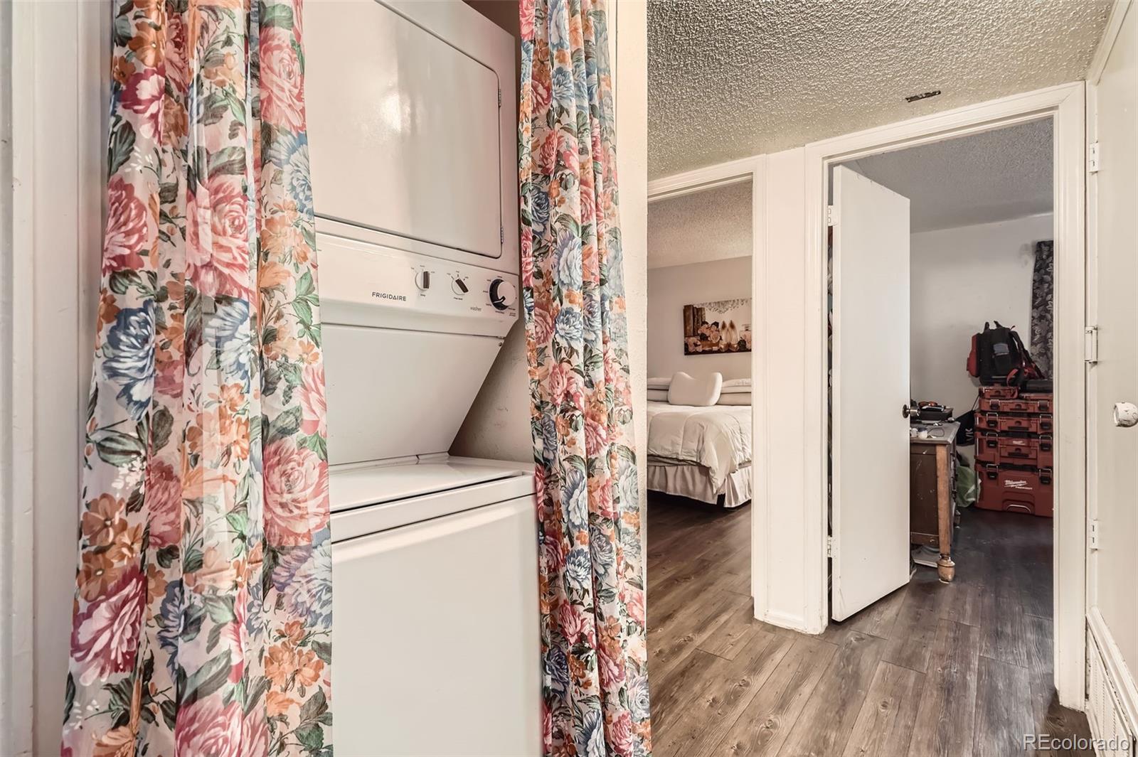 1358 South Irving Street, Unit 53 Denver, CO 80219 - Photo 13 of 28 a bathroom with a toilet and a shower