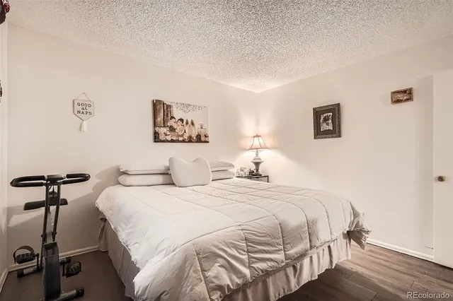 a bathroom with a double vanity sink toilet and shower
