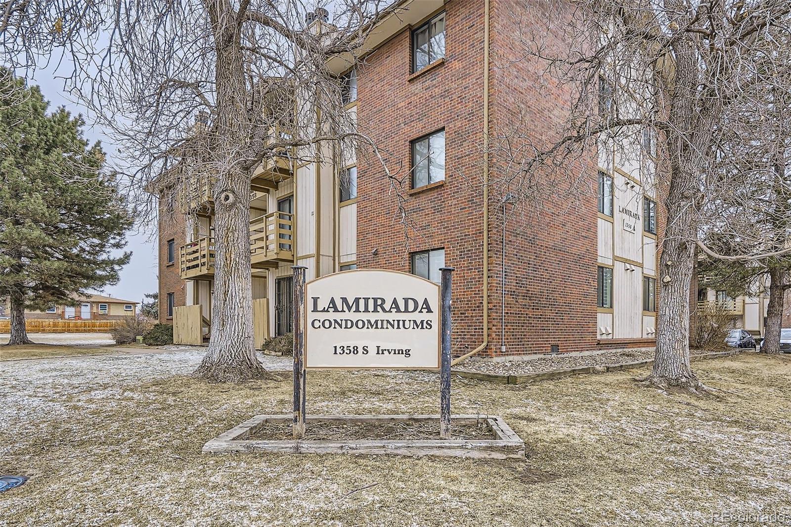 1358 South Irving Street, Unit 53 Denver, CO 80219 - Photo 27 of 28 a sign on the side of a street