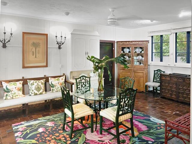 80 Middle Road Palm Beach, FL 33480 - Photo 12 of 33 a view of a dining room with furniture one side kitchen view and wooden floor