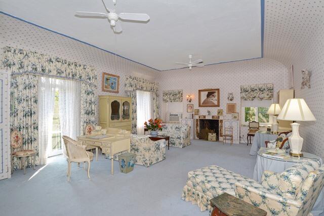 80 Middle Road Palm Beach, FL 33480 - Photo 22 of 33 a living room with fireplace furniture and decor