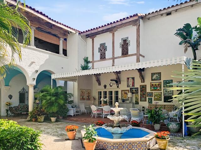 80 Middle Road Palm Beach, FL 33480 - Photo 29 of 33 a front view of house with yard outdoor seating and barbeque oven