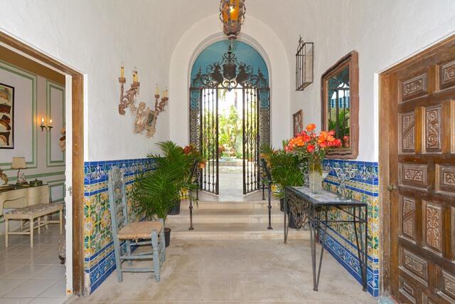 80 Middle Road Palm Beach, FL 33480 - Photo 5 of 33 a lobby with furniture and a potted plant