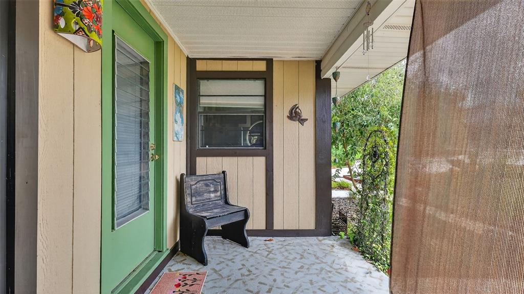 6499 Nebula Street Weeki Wachee, FL 34613 - Photo 18 of 54 a view of outdoor space and porch