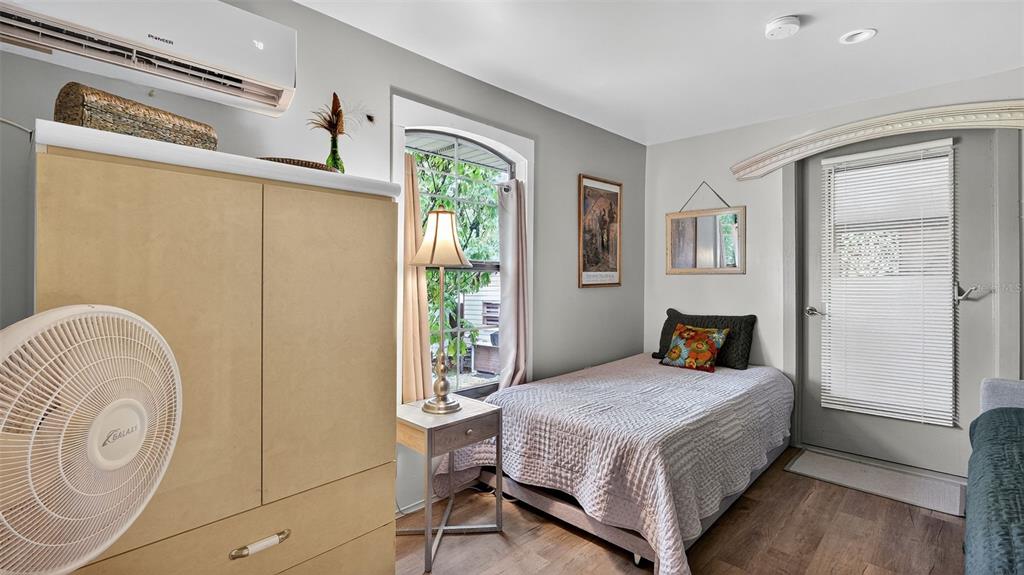 6499 Nebula Street Weeki Wachee, FL 34613 - Photo 26 of 54 a bedroom with a bed and a window