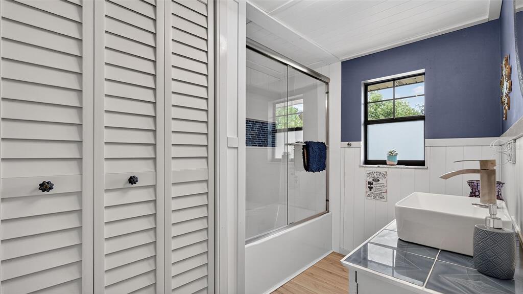 6499 Nebula Street Weeki Wachee, FL 34613 - Photo 29 of 54 a bathroom with a bathtub and a shower