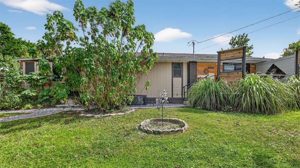 6499 Nebula Street Weeki Wachee, FL 34613 - Photo 35 of 54 a view of a backyard with plants and a patio