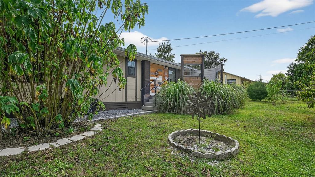 6499 Nebula Street Weeki Wachee, FL 34613 - Photo 42 of 54 a view of a back yard of the house