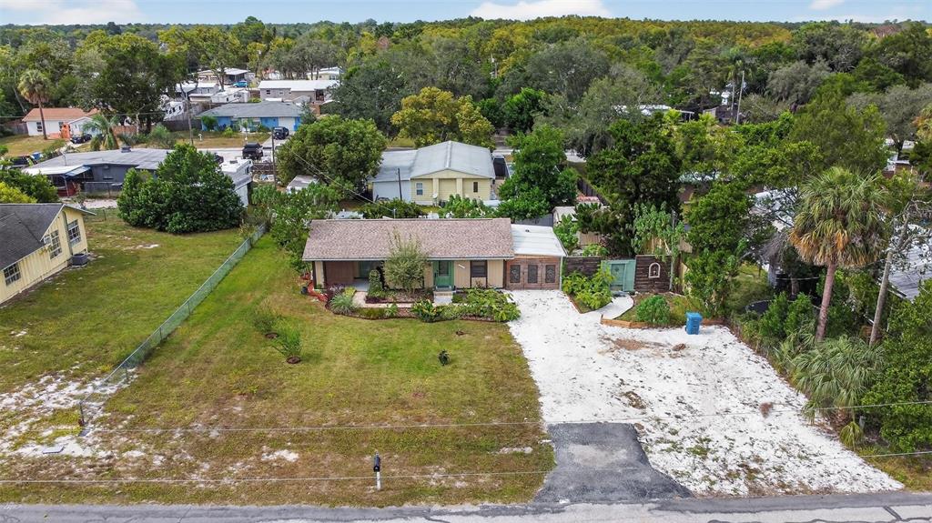 6499 Nebula Street Weeki Wachee, FL 34613 - Photo 43 of 54 an aerial view of a house with a yard