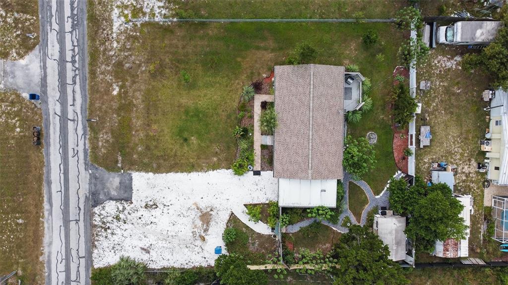 6499 Nebula Street Weeki Wachee, FL 34613 - Photo 46 of 54 an aerial view of a house with a yard