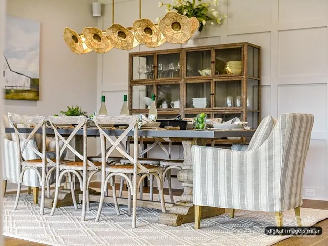 a spacious bedroom with a bed and a large window